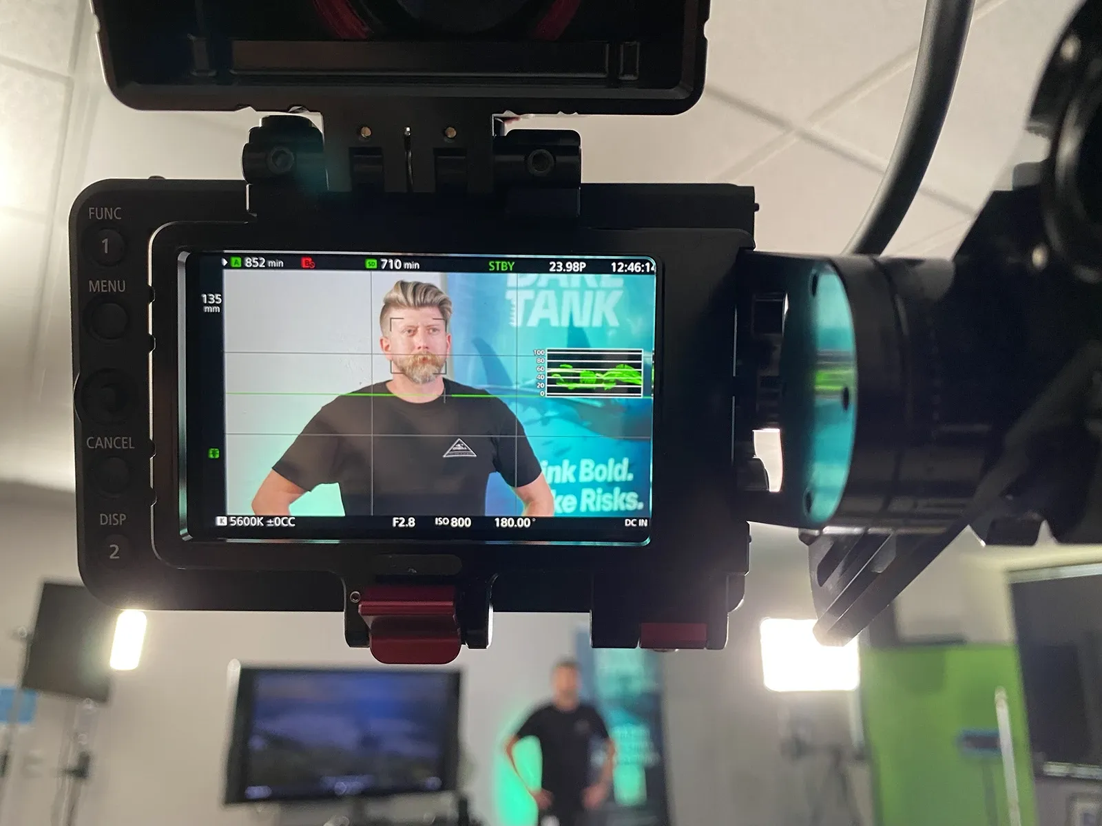 Behind-the-scenes camera-monitor view of a TD SYNNEX Dare Tank production shot on set